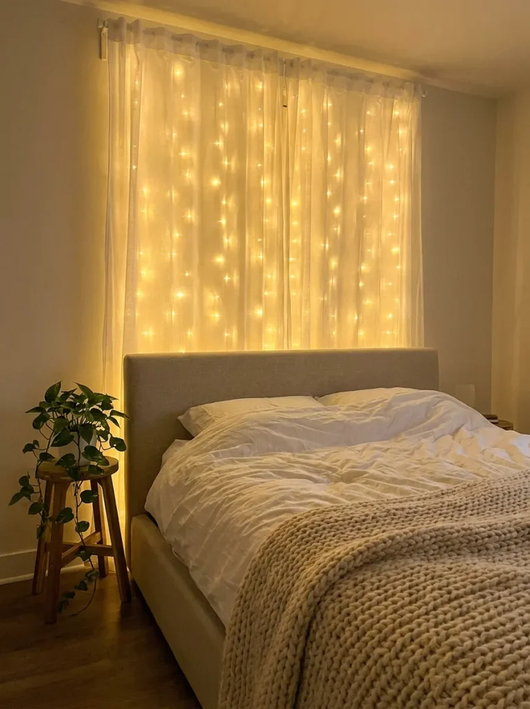 Curtain string lights in bedroom