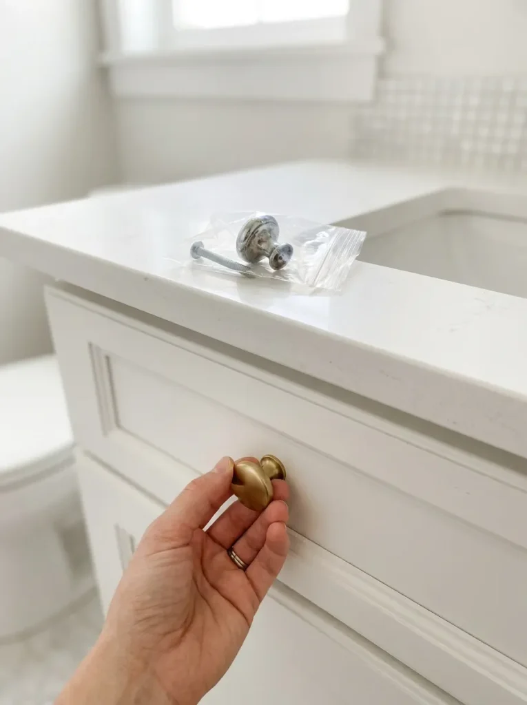 Hand installing brass knob