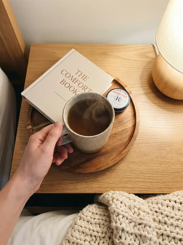 Hand setting mug on tray