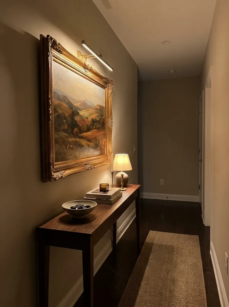 Painting hanging over console table