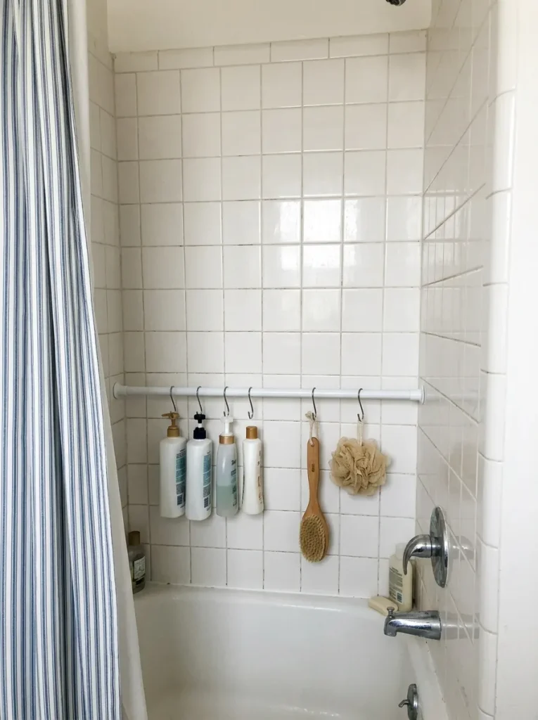 Tension rod with hanging bottles