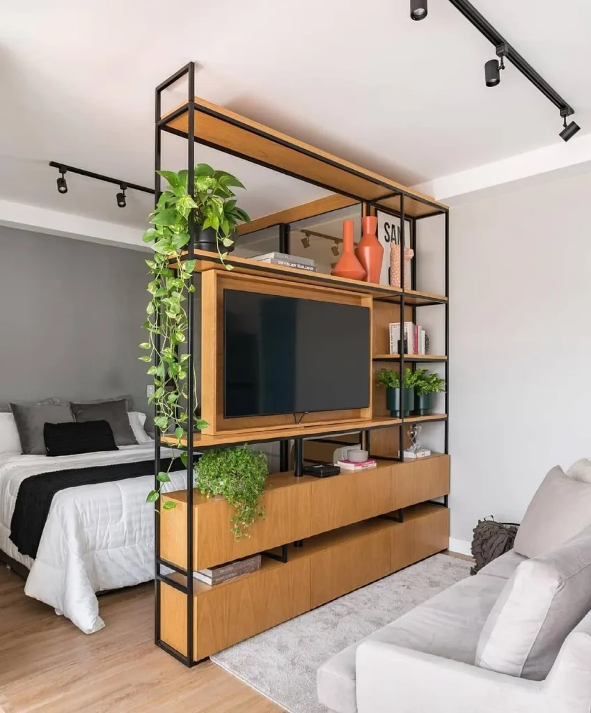 Turn the Divider Into the TV Wall So the Bed Gets Its Own Room