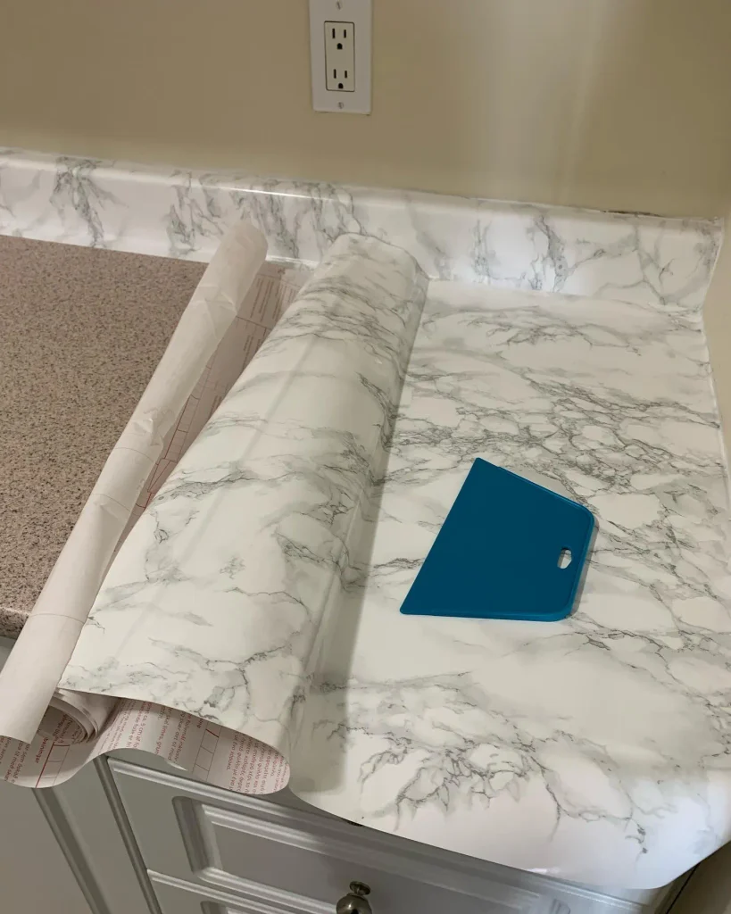 Wrap Dated Laminate Counters in Marble-Look Film